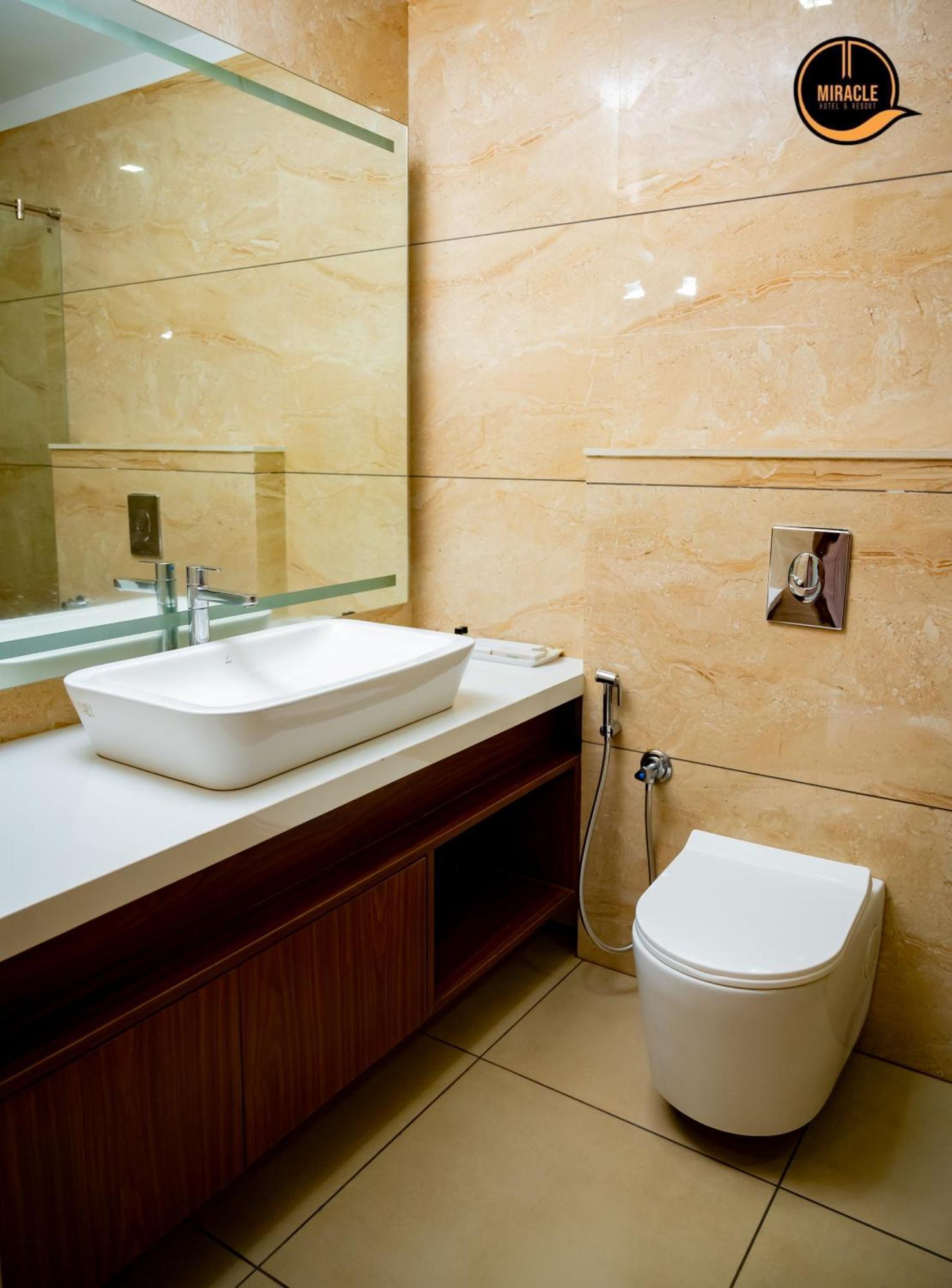 Miracle Hotel And Resorts Kozsíkóde Szoba fotó